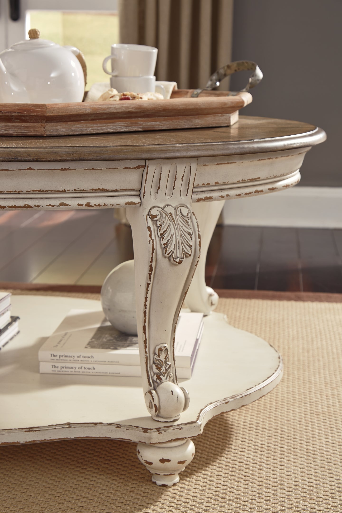 Realyn Coffee Table - White/Brown