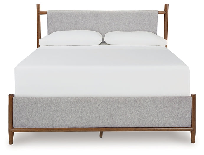 Lyncott California King Upholstered Bed with Mirrored Dresser and Chest