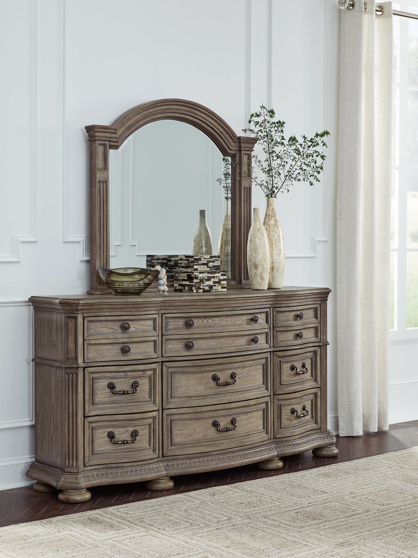 Ardenfield King Upholstered Sleigh Bed with Mirrored Dresser and Chest